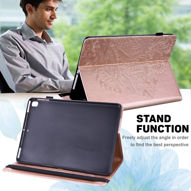 Rose gold folio tablet case with embossed peacock pattern and adjustable stand viewing angle