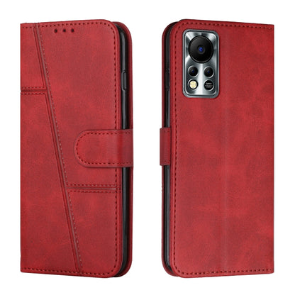 Red leather flip phone case with stitched panels, buckle strap, card holder, camera cutout