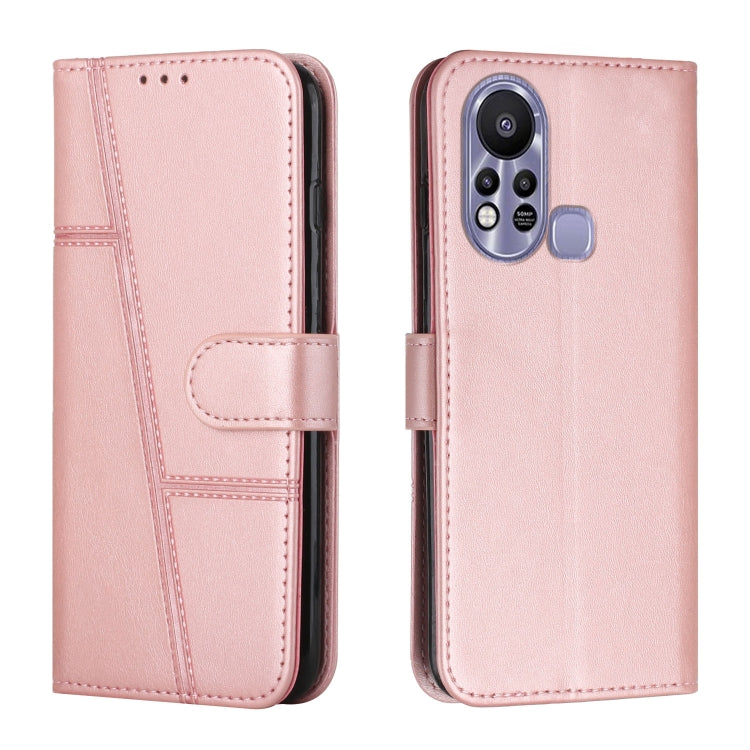 Pink leather flip phone case with stitched panels and foldover strap, buckle closure