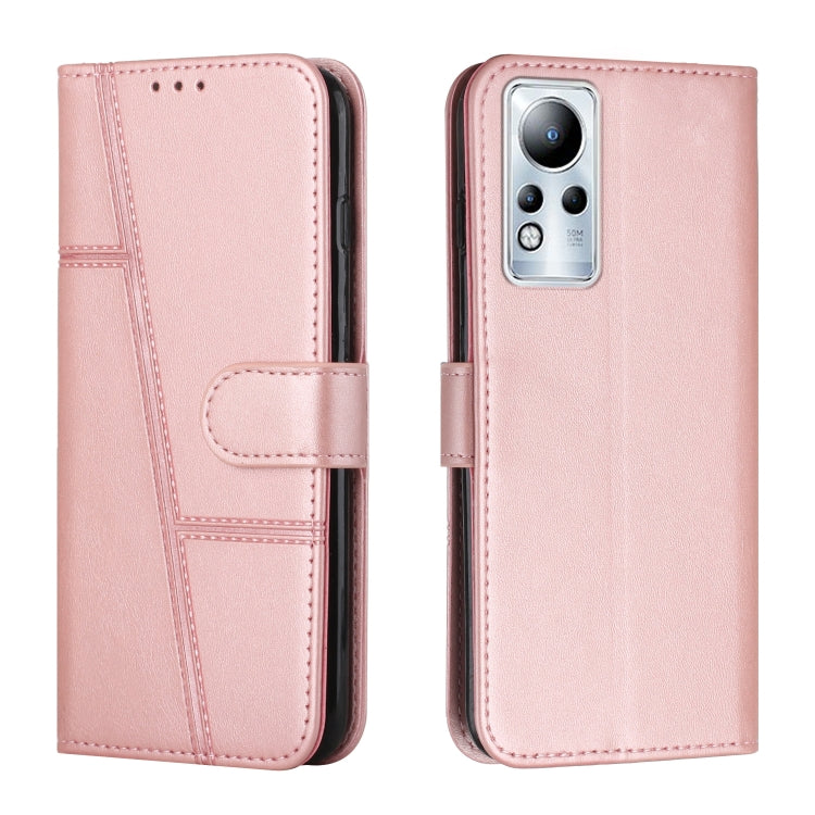Pink leather flip phone case with stitched panels and foldover strap, with camera opening