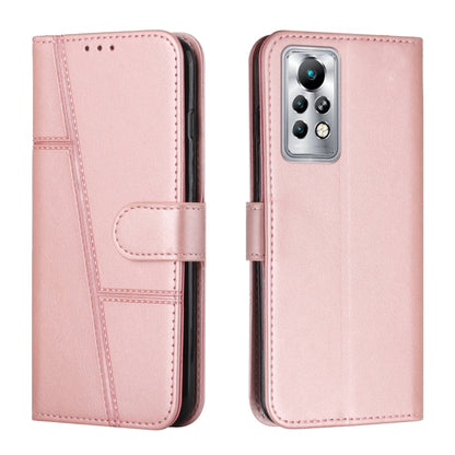 Pink leather flip phone case with stitched panels and foldover strap, rear lens cutout