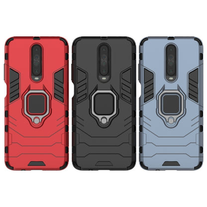 Red, black, and blue rugged phone cases with magnetic ring holders