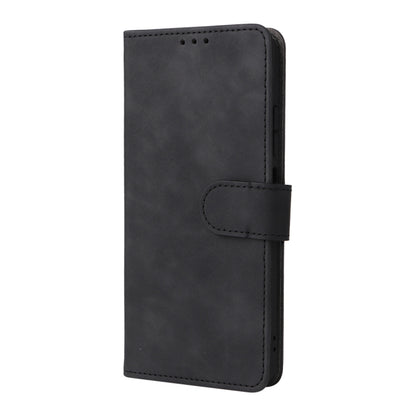 Black leather flip phone case with magnetic closure and stitched hand strap