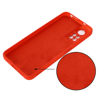 Red liquid silicone phone case with textured finish and side button cutouts