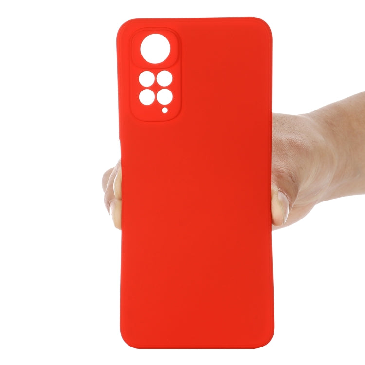 Red liquid silicone phone case, back view with lanyard strap hole