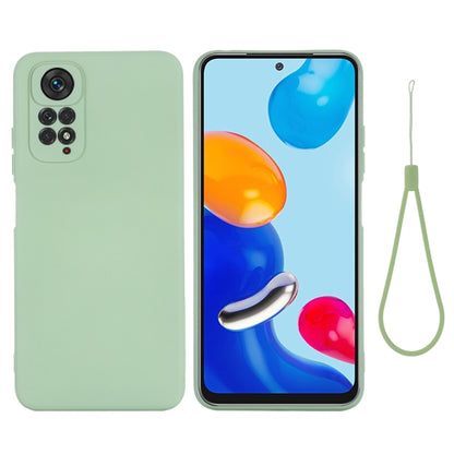 Green liquid silicone phone case with camera cutouts and lanyard strap