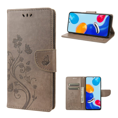 Brown flip leather phone case with embossed butterfly and floral swirl design