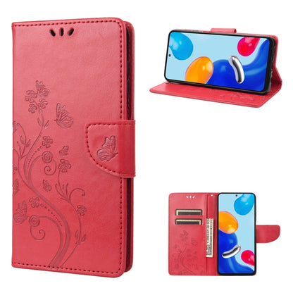 Pink/red flip leather phone case with embossed butterfly and floral scroll design