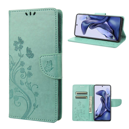 Embossed butterfly pattern flip leather phone case, teal with folio stand and card slot