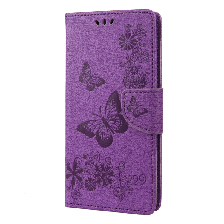 Purple butterfly embossed leather folio phone case, front view with flip cover