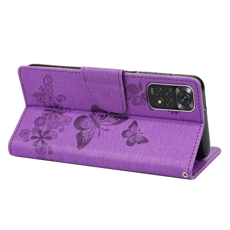 Purple butterfly embossed flip leather phone case, angled view of camera cover