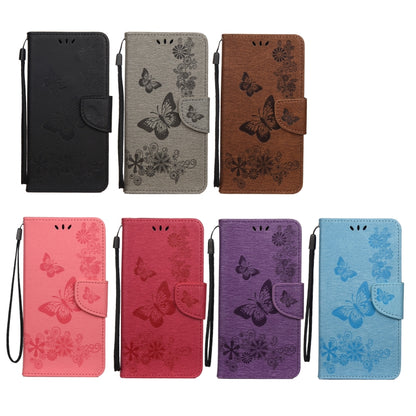 Assorted butterfly embossed flip leather phone cases in multiple colors