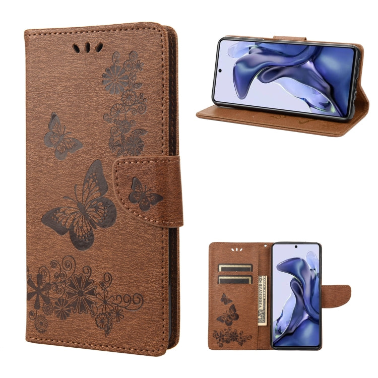 Brown butterfly embossed leather flip phone case with card slots and stand feature
