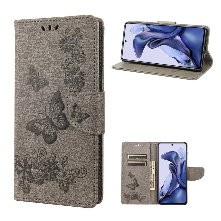 Light grey butterfly embossed leather flip phone case with card slots and stand feature