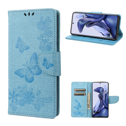 Light blue butterfly embossed flip phone case with front cover and stand