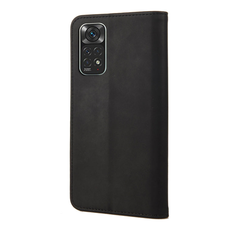 Black magnetic leather phone case with camera cutout and smooth back panel