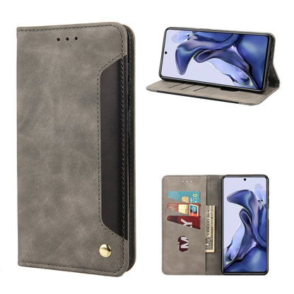 Grey leather flip phone case with magnetic closure and card slots, front and stand