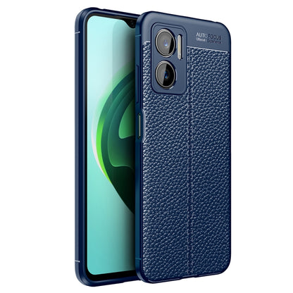 Blue TPU shockproof phone case with litchi-texture back and dual camera cutouts