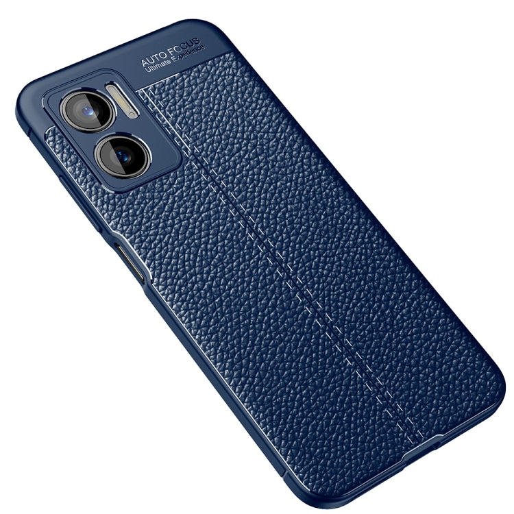 Blue litchi-textured TPU phone case with dual camera cutouts and raised edges
