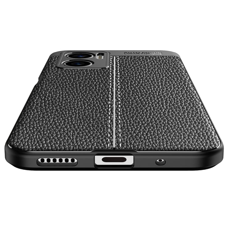 Black TPU phone case with litchi texture, camera cutout, and bottom opening