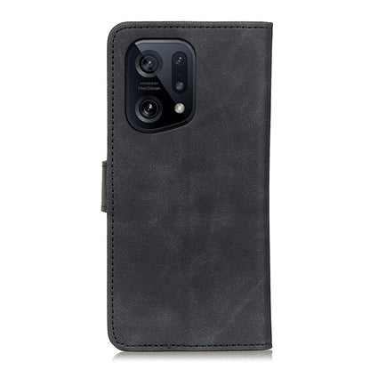 Black leather folio phone case with cutout for rear cameras