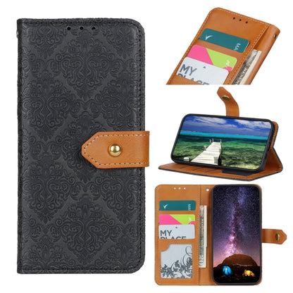 Black embossed floral leather phone folio case with tan strap, card slots, and stand