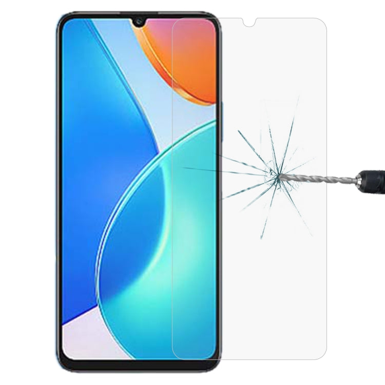 Tempered glass screen protector on smartphone front, showing crack test protection.