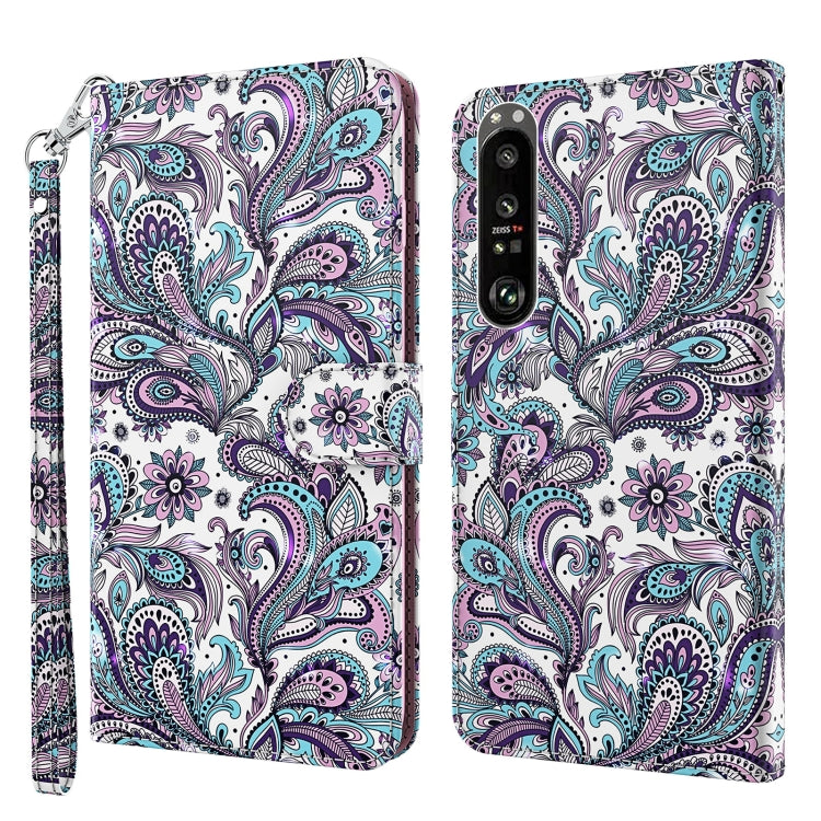 White phone case with purple and teal floral paisley pattern, wrist strap, dual view