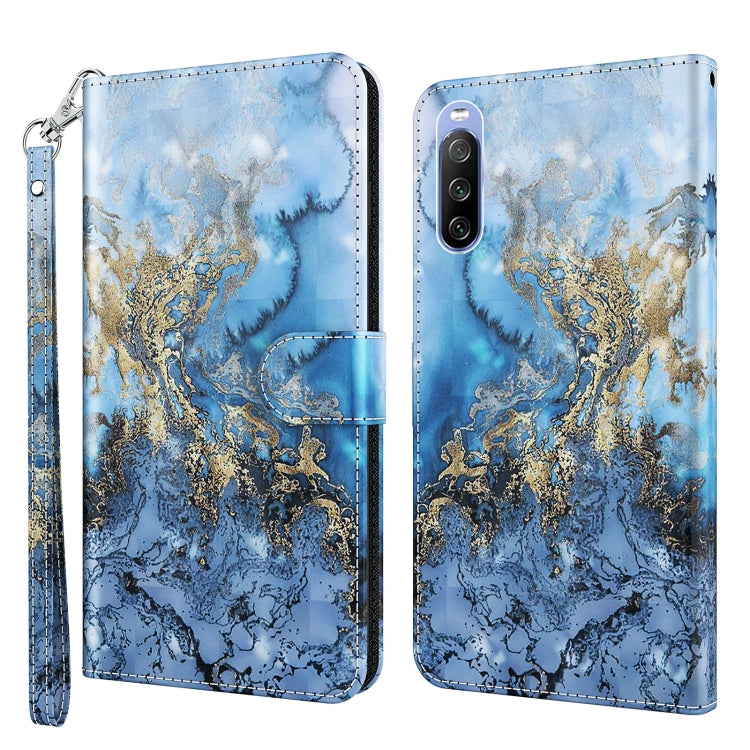 Phone case with blue and gold marbled pattern, leather-look finish, wrist strap, camera cutout