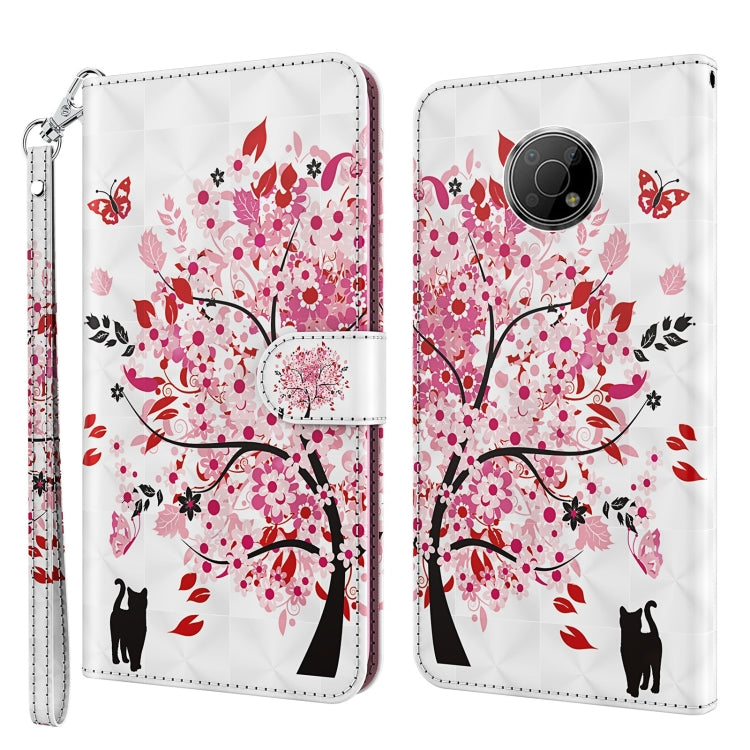 Phone case with pink floral tree and cat silhouettes; wrist strap; rounded camera cutout.
