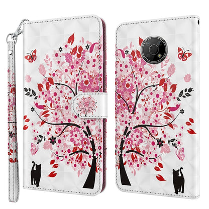 Phone case with pink floral tree and cat silhouettes; wrist strap; rounded camera cutout.