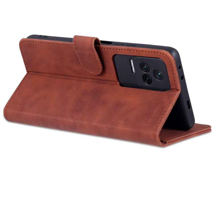 Brown flip leather phone case with magnetic flap and camera cutout