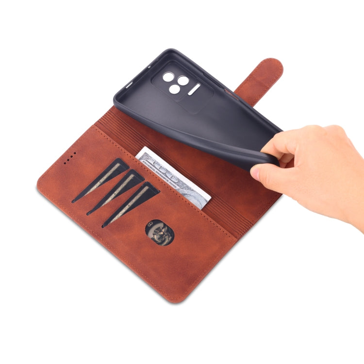 Brown wallet-style flip phone case with hand opening the card holder
