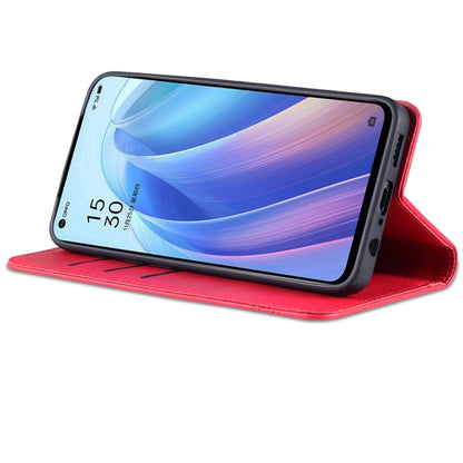 Red magnetic flip phone case folded into a viewing stand