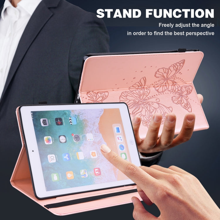 Pink folio tablet case standing open for viewing, with embossed butterfly design.