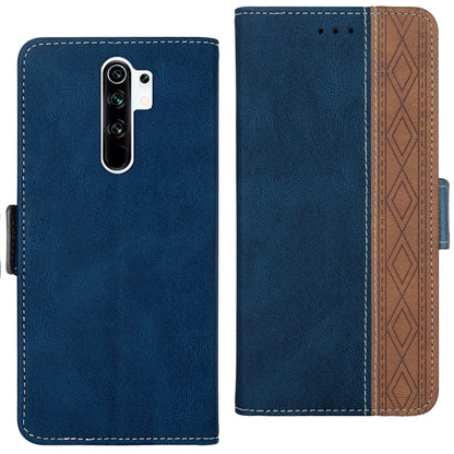 Blue phone case with magnetic flap, brown patterned inside, and cutouts for camera and speaker