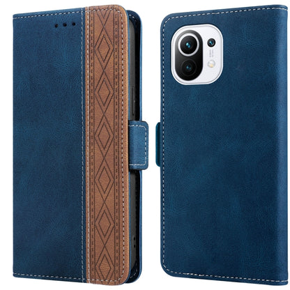 Royal blue leather phone case with folio flap, side stitching, and patterned card slot interior