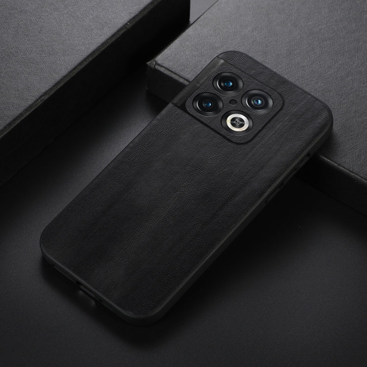 Black PU texture phone case, angled view, with camera lens openings