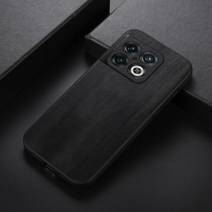 Black PU texture phone case, angled view, with camera lens openings