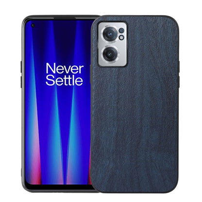 Blue wood-texture PU phone case with textured back and raised camera lens area.