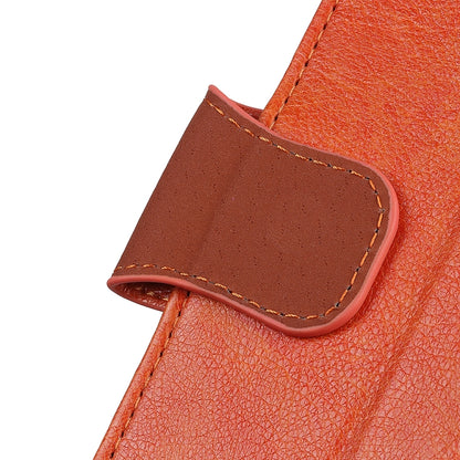 Close-up of brown backing tab on orange leather flip phone case with stitched edge