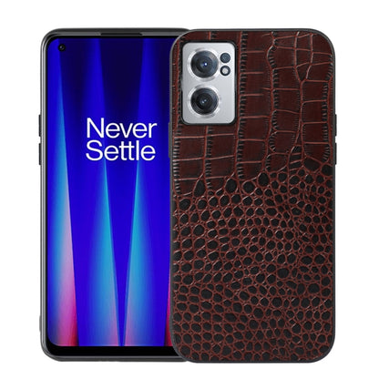 Coffee-brown crocodile-embossed leather phone case with camera cutouts and raised bezel