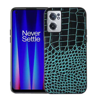 Crocodile-texture leather phone case with teal pattern, cutouts for dual cameras