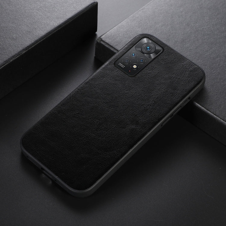 Black textured PU phone case angled view with camera cutout and protective edges.