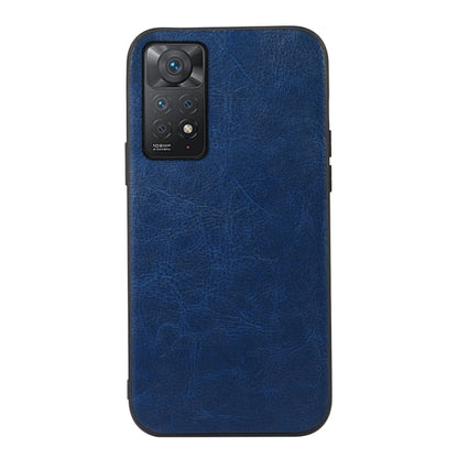 Blue textured PU phone case with camera cutout and raised edges.
