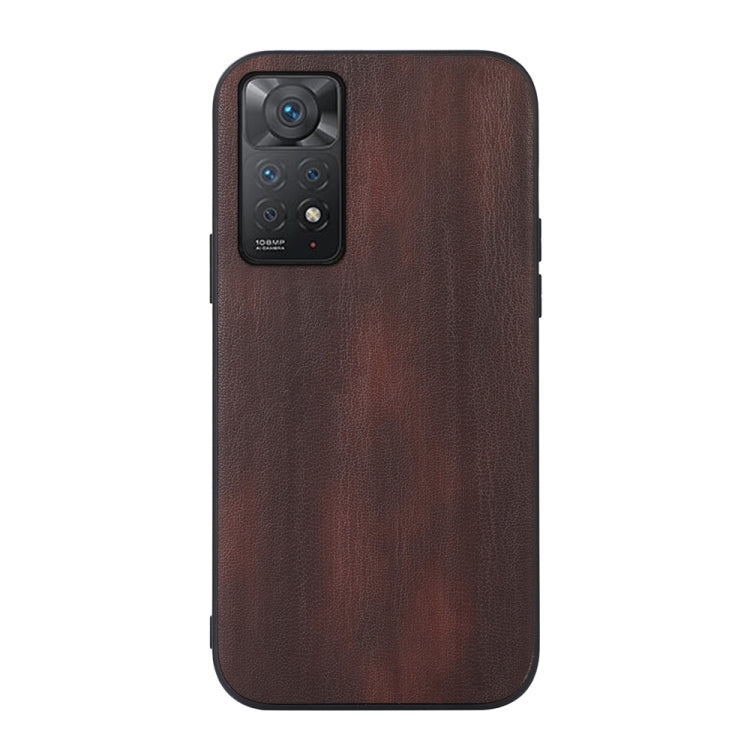 Brown PU phone case with cowhide-style texture and camera cutout for a smartphone