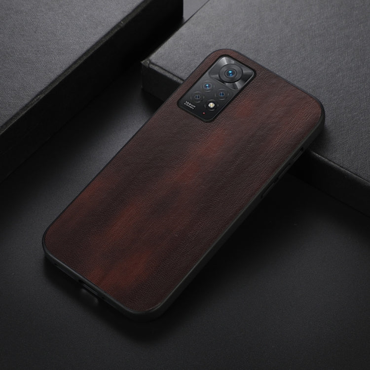 Brown textured PU phone case with camera cutout, shown at an angled side view