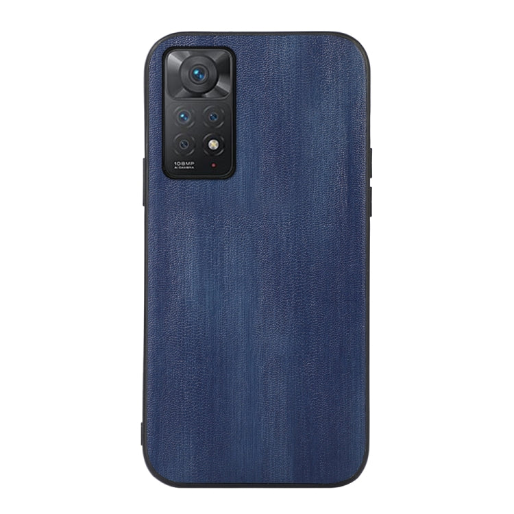 Blue textured PU phone case with camera cutout and protective raised edges