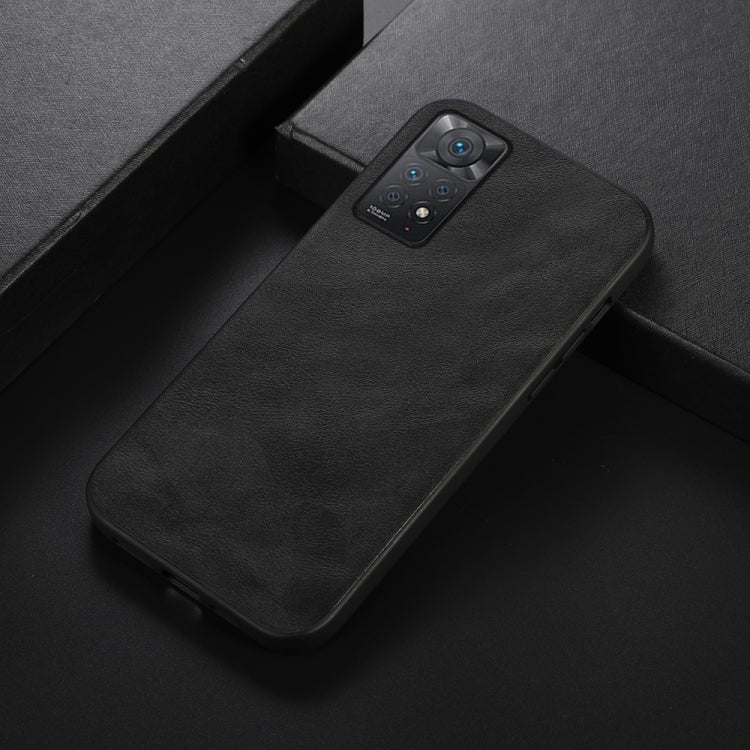 Cowhide-texture PU phone case, black, angled view with camera cutouts and buttons.