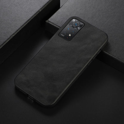 Cowhide-texture PU phone case, black, angled view with camera cutouts and buttons.